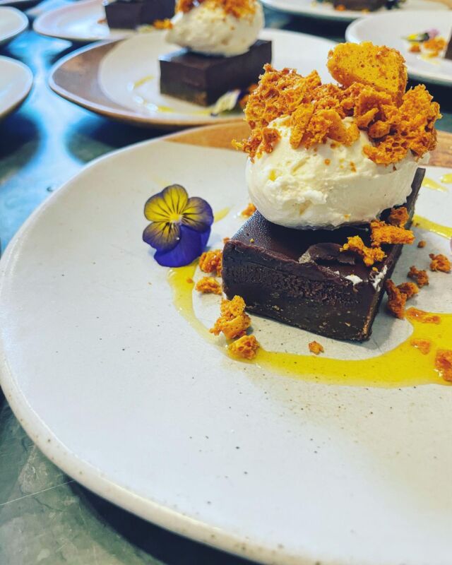 One from the weekend.. Dark chocolate and orange tart, smashed honeycomb, vanilla cream and orange syrup.🍊
.
An autumnal dessert to match the weather. 🍂
.
#food #wedding #cornwall #cornishwedding #intimate #dessert #autumn #foodphotography